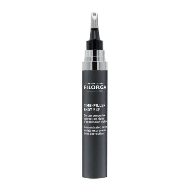 Black skincare serum bottle with silver cap on a white background