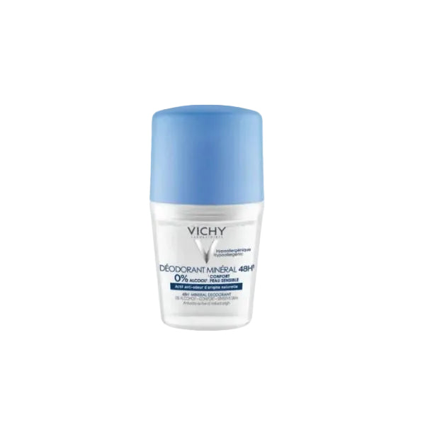 Vichy deodorant bottle with blue cap on a white background