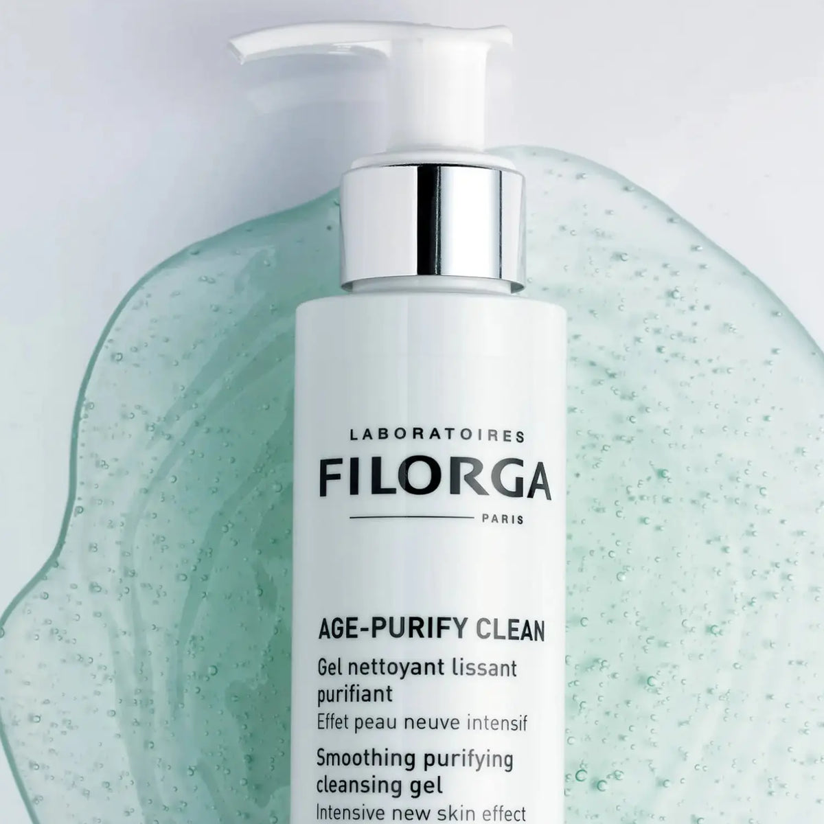 Filorga AGE-PURIFY CLEAN cleansing gel with pump on a texture background