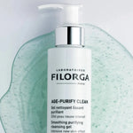 Filorga AGE-PURIFY CLEAN cleansing gel with pump on a texture background