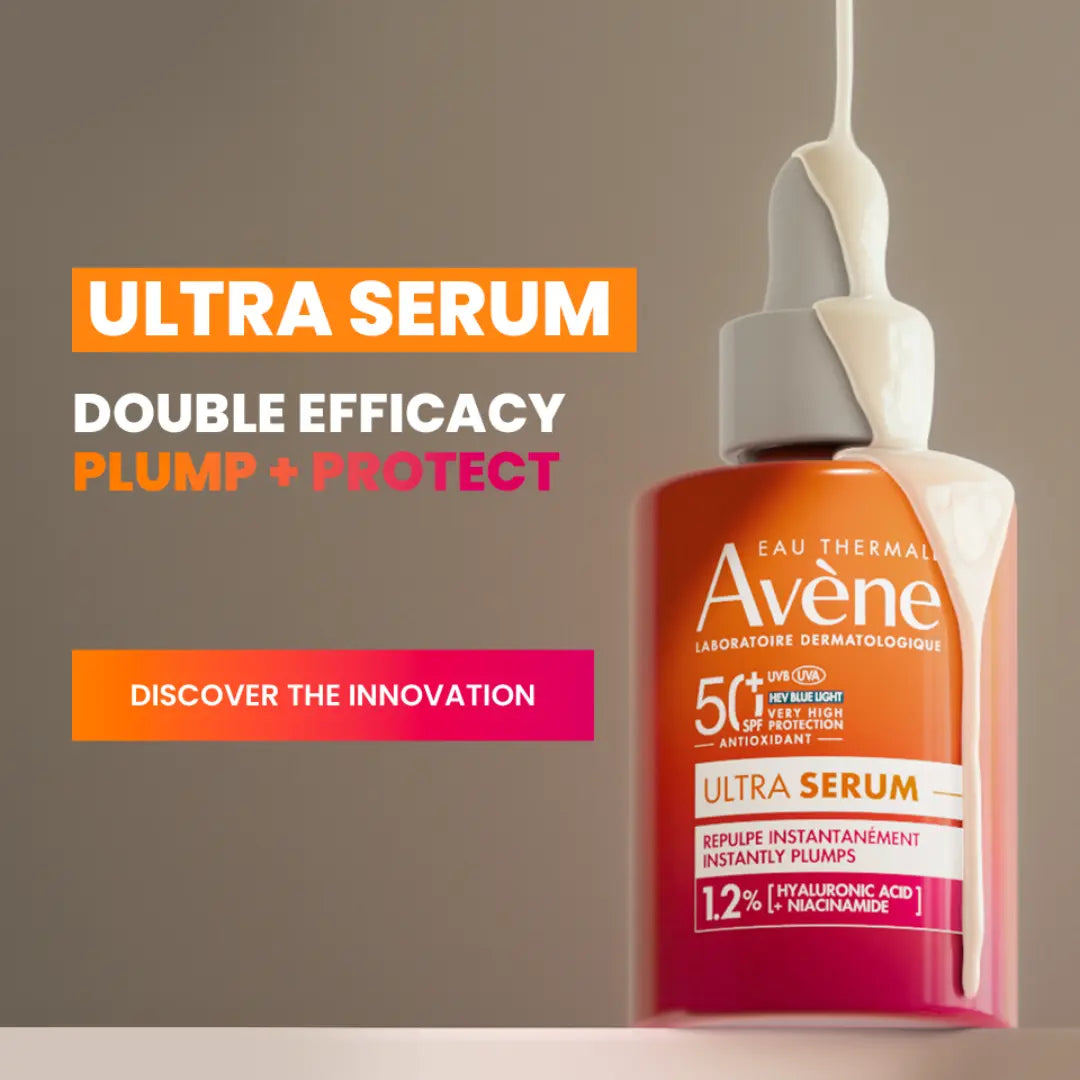 Avene Ultra Serum bottle with dropper on a gray background