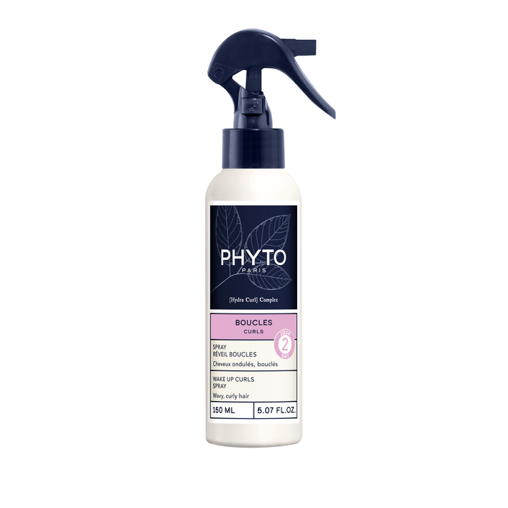 White spray bottle with black nozzle and Phyto branding on a white background