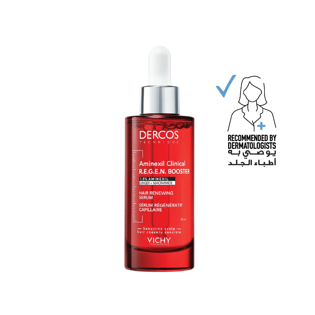 Red bottle of Dercos hair serum with dropper on a white background