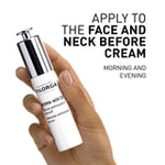 Hand holding a skincare product with text on a white background