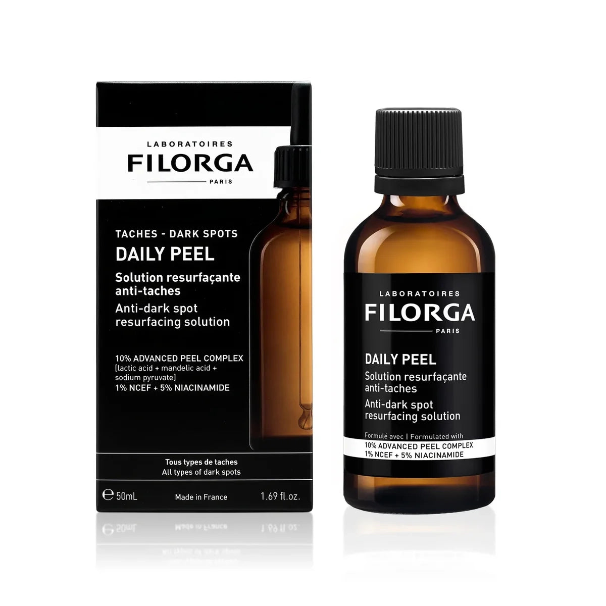 Filorga Daily Peel anti-dark spot solution shown as an amber glass bottle with a black cap next to its black and white retail box on a white background.