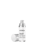 Filorga skincare serum bottle on a black background