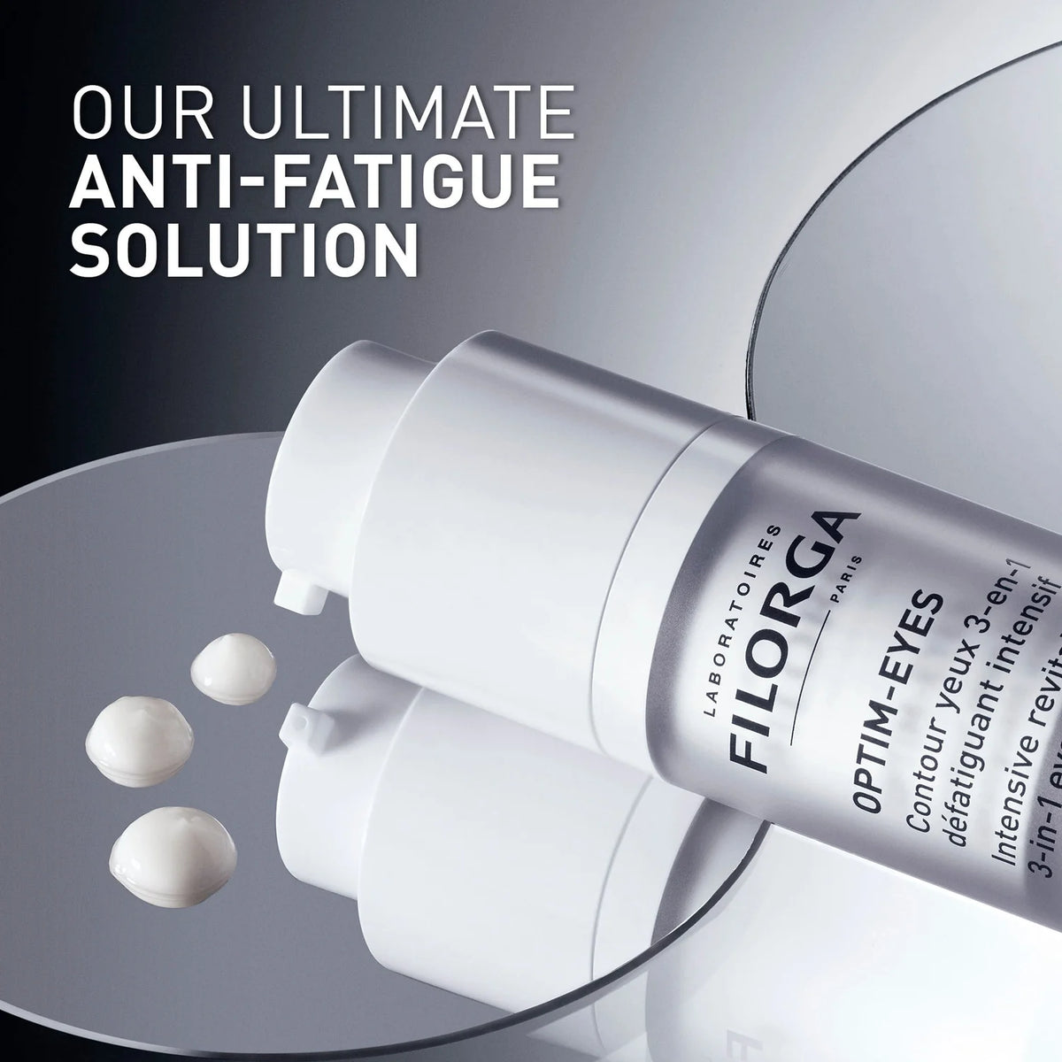 Filorga Optim-Eyes cream bottle with text 'Our Ultimate Anti-Fatigue Solution' on a gray background
