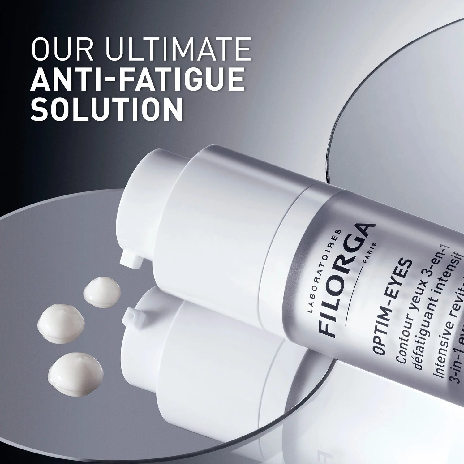 Filorga Optim-Eyes cream bottle with text 'Our Ultimate Anti-Fatigue Solution' on a gray background