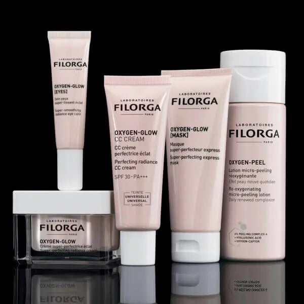 Collection of Filorga Oxygen glow range  on a reflective surface with a black background