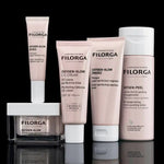 Collection of Filorga Oxygen glow range  on a reflective surface with a black background