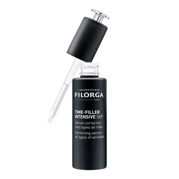 Filorga serum bottle with dropper on a white background
