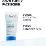 A 50 ml tube of Uriage Gentle Jelly Face Scrub with Hibiscus extract, shown on a clean white background with promotional text highlighting its double exfoliation action and skin-matifying benefits.