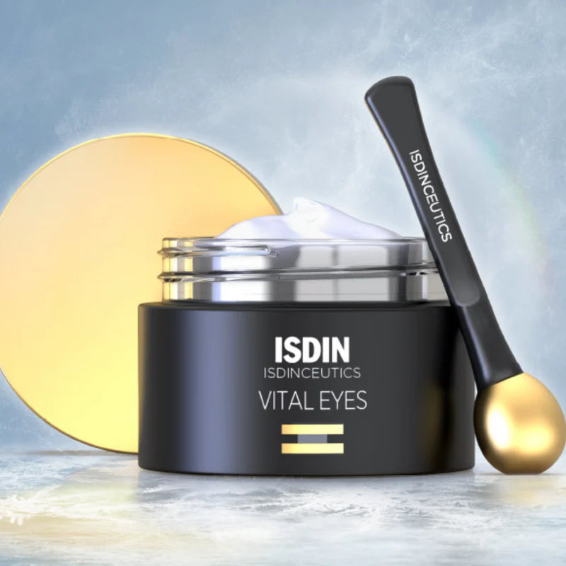 ISDIN skincare product with packaging and applicator on a white background