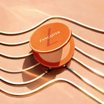 Lancaster makeup compact on a peach background