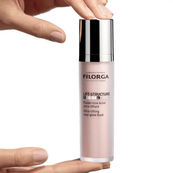 Filorga LIFT-STRUCTURE RADIANCE  holding hand