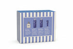 Uriage baby product set packaging with blue and white striped design on a white surface.