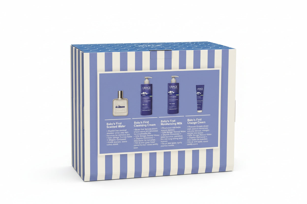 Uriage baby product set packaging with blue and white striped design on a white surface.