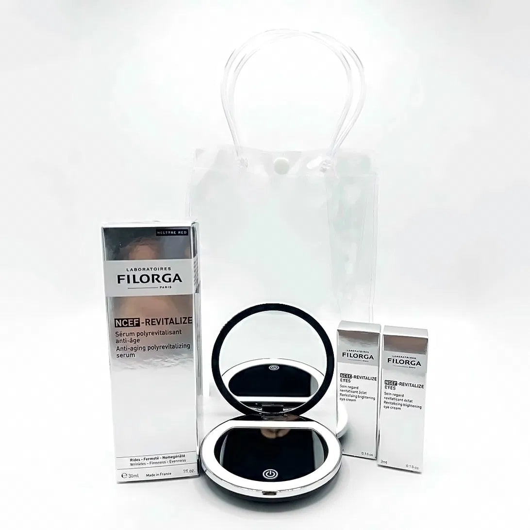 Filorga NCEF-Revitalize anti-aging serum 30 ml and two NCEF-Revitalize Eyes eye cream minis with a black LED compact mirror and clear gift bag