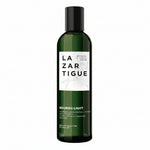 Green bottle of Lazartigue product on a white background