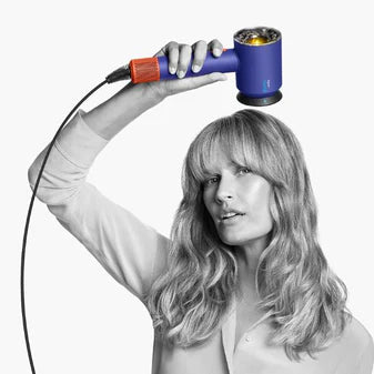 Dyson Wide-tooth comb attachment designed for textured curly and coily hair available at teh distriqt lebanon