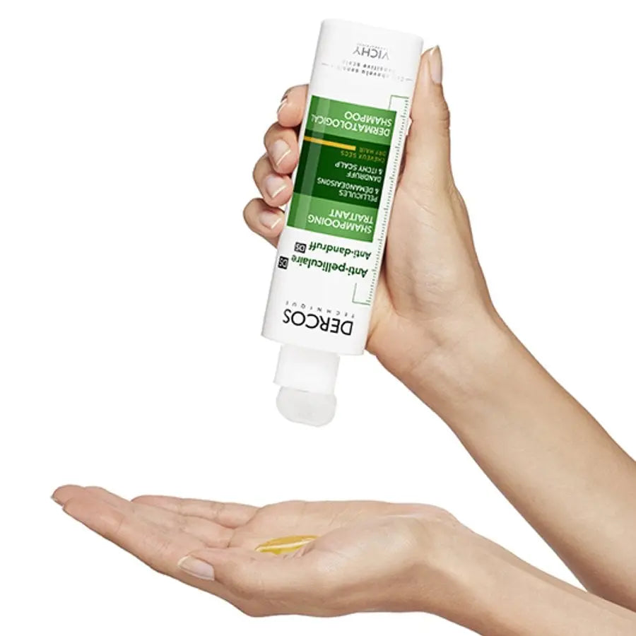 Applying Vichy Dercos Anti-Dandruff Shampoo to dry scalp with dandruff