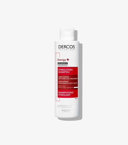 Vichy Dercos Stimulating Shampoo bottle on a white background